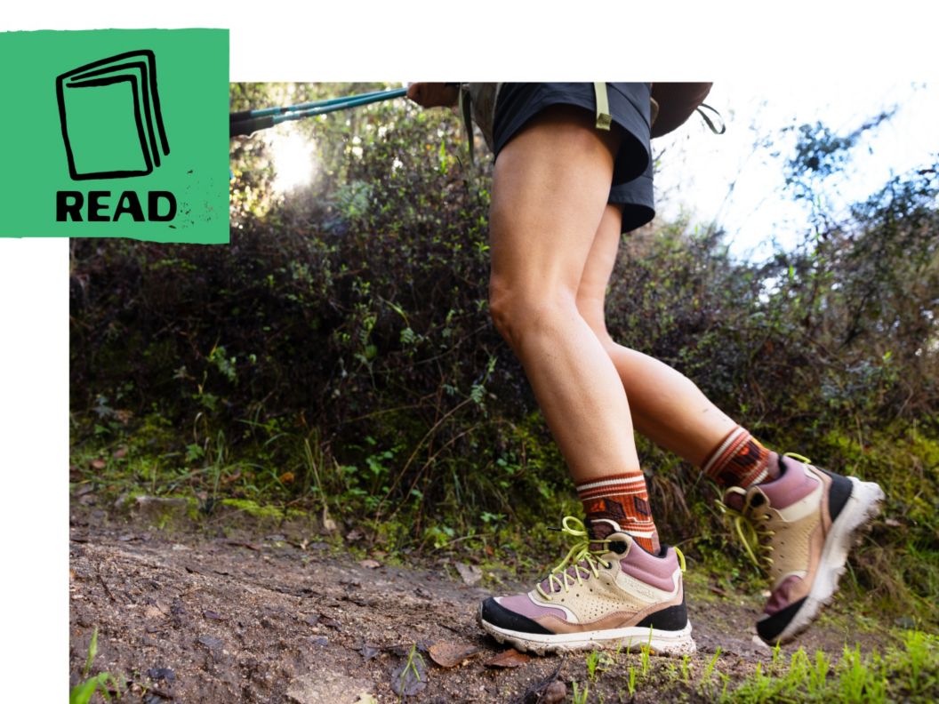 A woman hikes on a trail. Text reads:    Best Hiking Shoes For Women     Fit Your Feet In Our Top Picks  